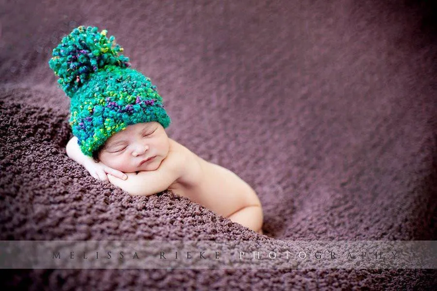 Rainbow Pom Hat in Teal Purple Yellow Green