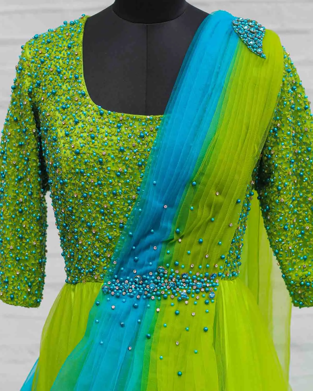 Sea blue and green color gradient gown with draped dupatta